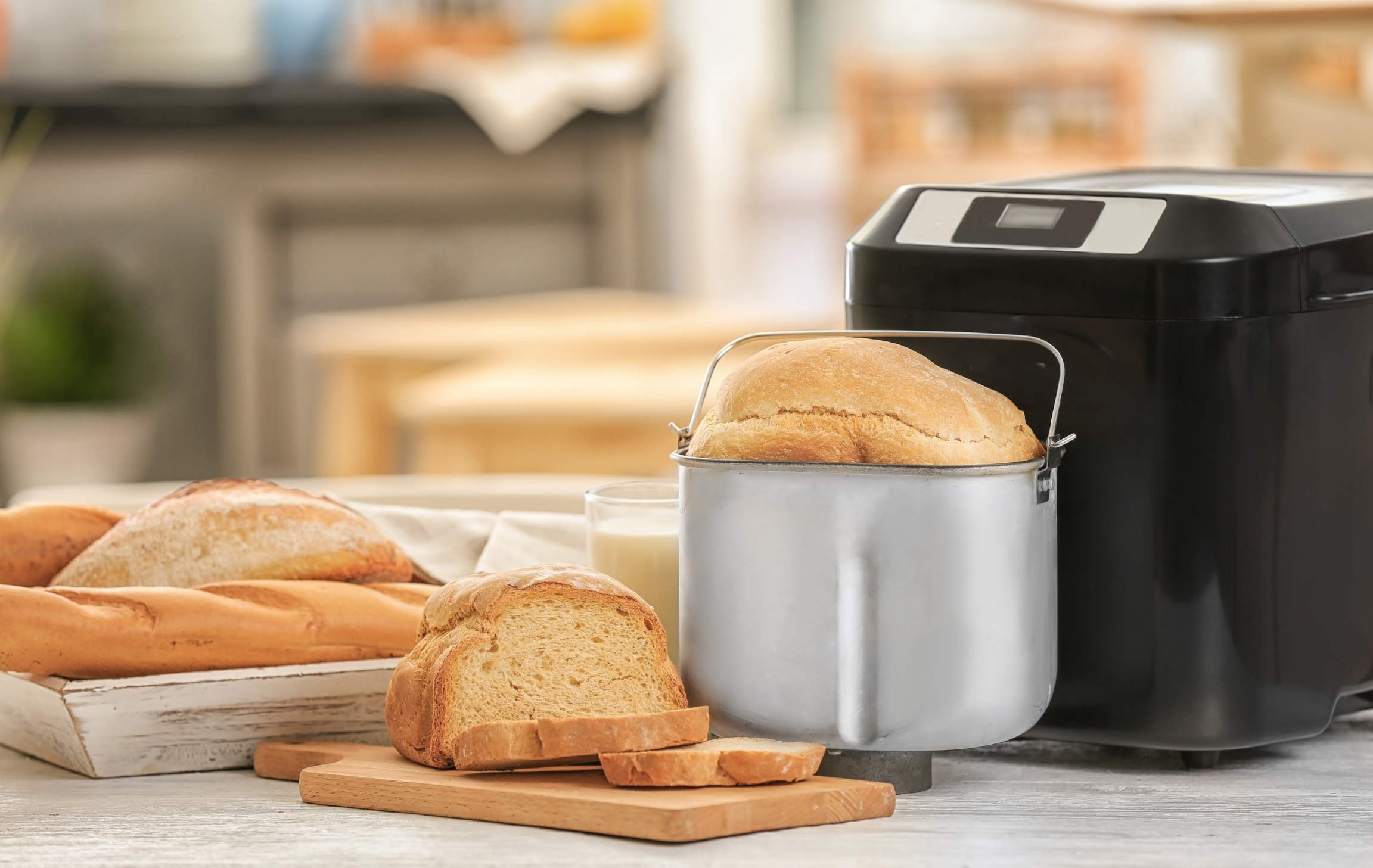 Loaf and Bread Machine on Table